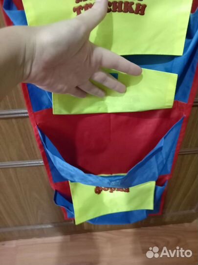 Кармашки на дверцу шкафчика в садике органайзер