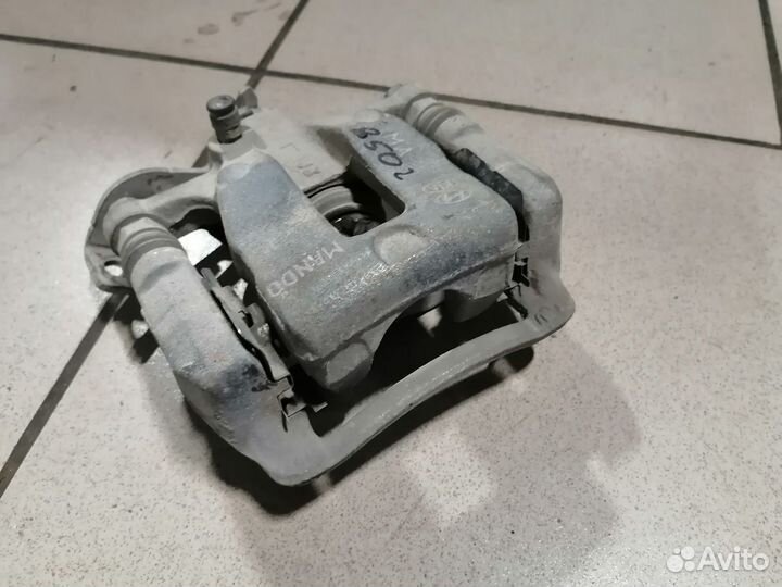 Суппорт тормозной задний левый Солярис 2011