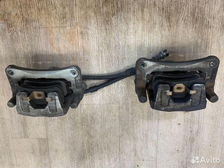 Суппорта и диски задняя Mitsubishi Lancer 10 CY3A