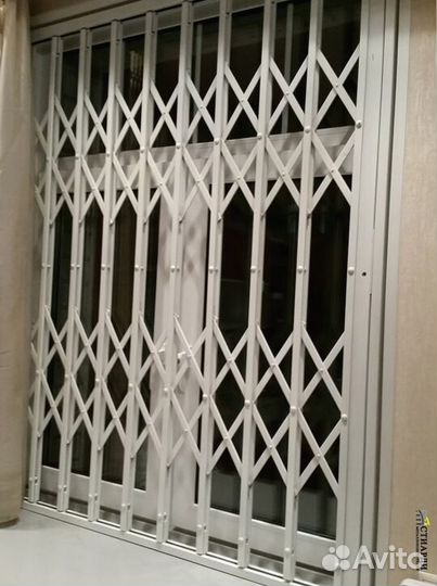 Решетка раздвижная на окна