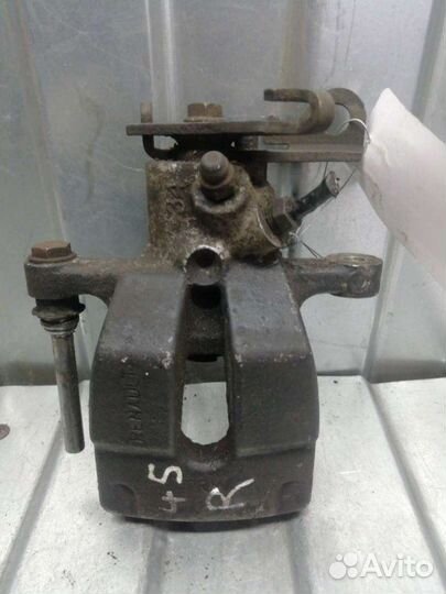 Суппорт тормозной задний правый Renault Megane 3