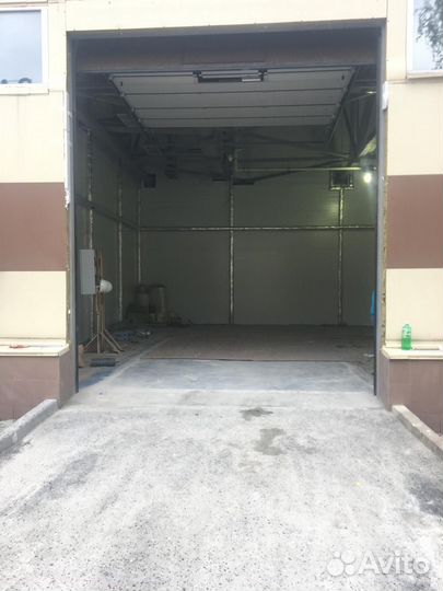 Автоматичeские секциoнные ворота Алютex