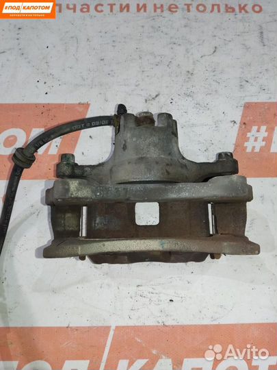 Суппорт тормозной передний левый Mitsubishi