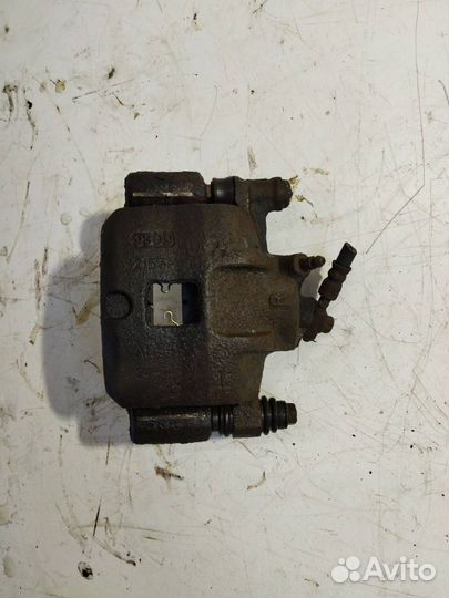 Суппорт тормозной передний правый Mazda 626 GD