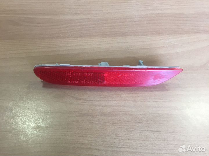 Отражатель левый заднего бампера Nissan X-Trail 32