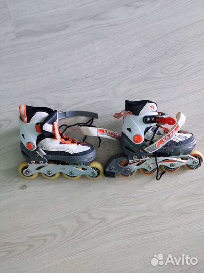 Роликовые коньки