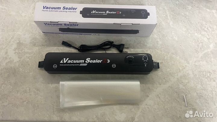 Вакуумный упаковщик