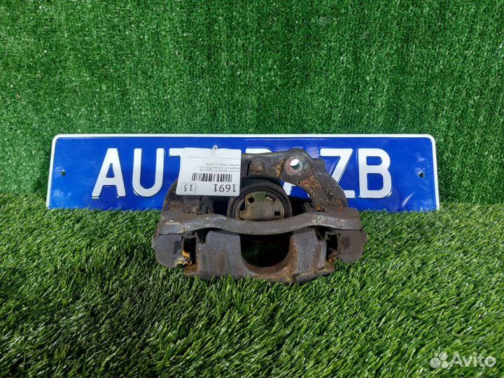 Суппорт тормозной передний левый Peugeot 207