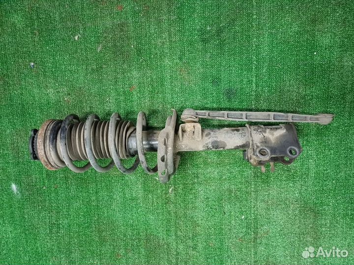 Амортизатор передний левый Opel Astra H