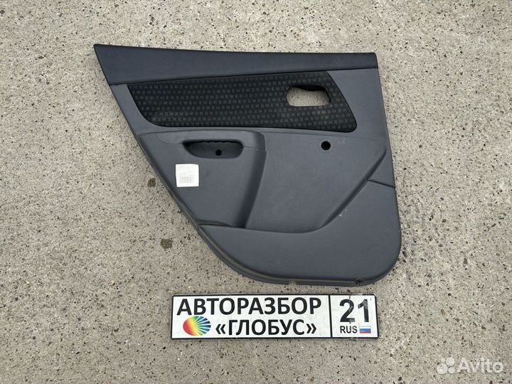 Обшивка двери задняя левая Kia Rio 2