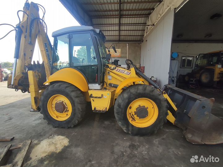 Экc Погрузчик New Holland