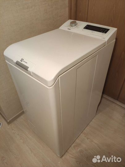 Стиральная машина с вертикальной загрузкой