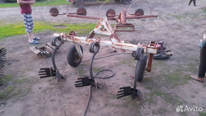 Междурядный окучник