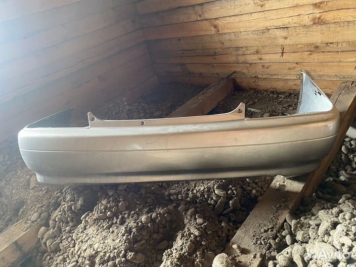 Бампер задний тойота карина