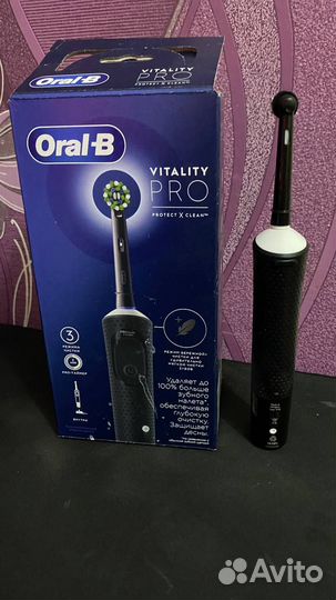 Электрическая зубная щетка oral b pro