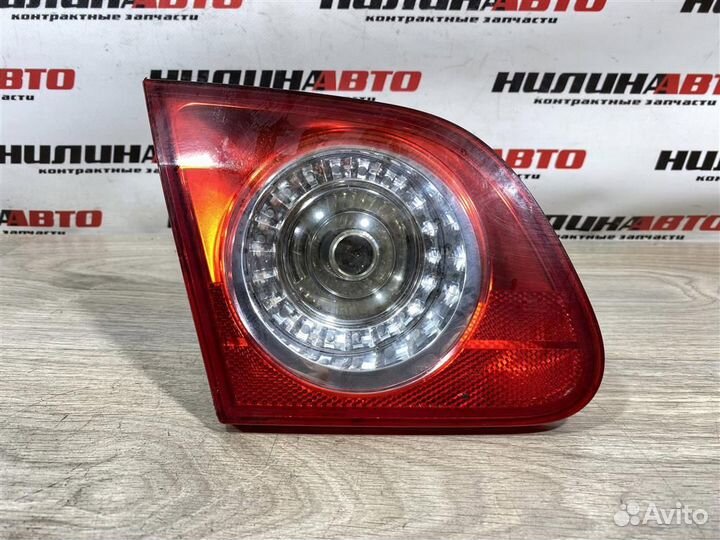 Фонарь левый в крышку багажника VW Пассат Б6