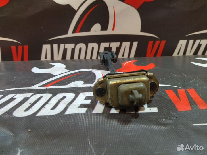 Ограничитель двери Ford Focus 1