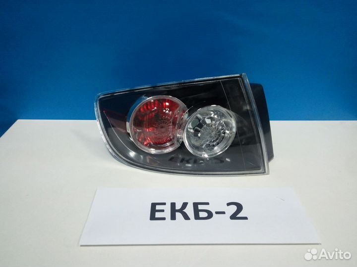 Фонарь левый внешний Mazda 3 1 вк 2003-2009