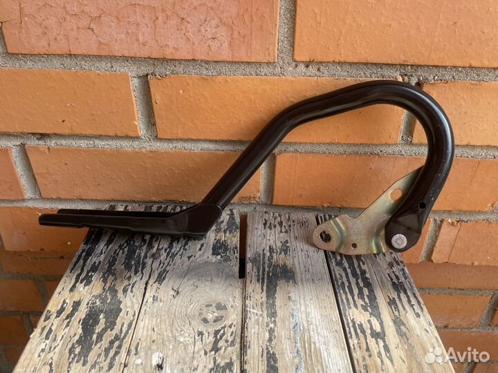 Петля капота левая Opel Zafira C