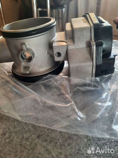 Новая Дросельная заслонка