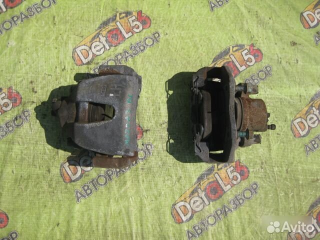 Суппорт тормозной передний Mazda 3 (Bl) Ii