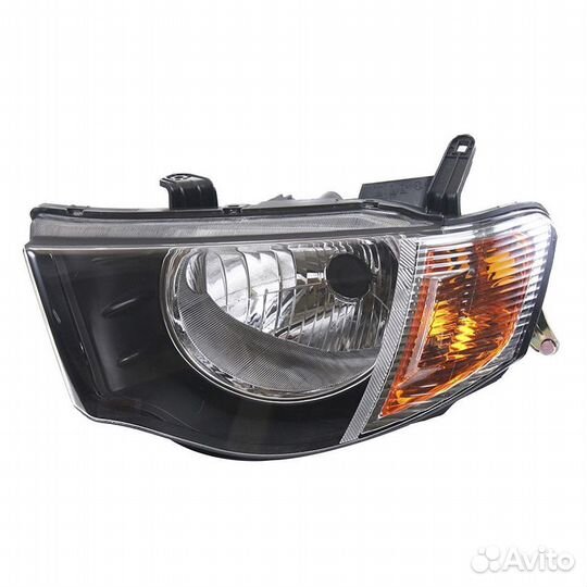 Фара левая механическая Mitsubishi L200 4