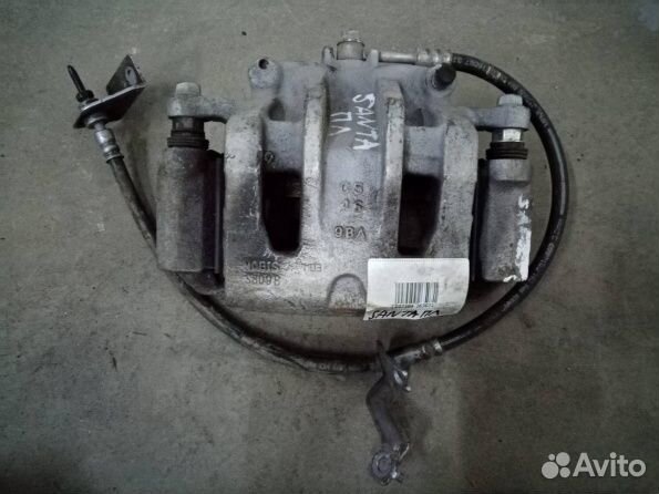 Суппорт передний левый Hyundai Santa Fe 4