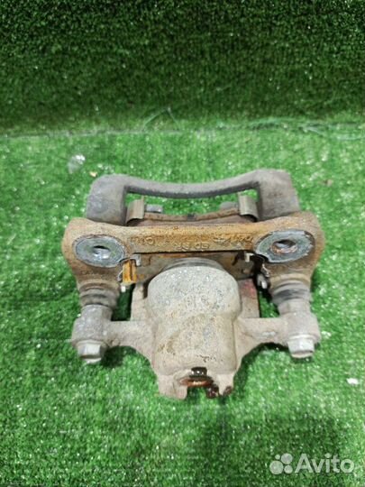 Суппорт тормозной задний левый Kia Ceed хэтчбек