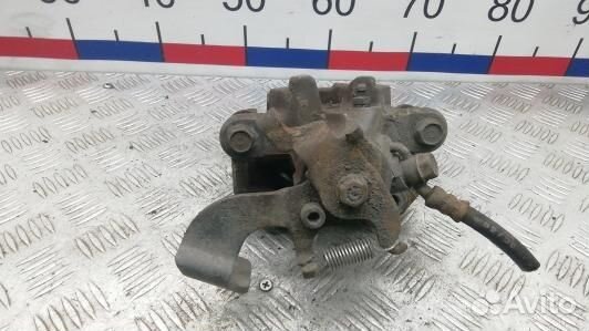 Суппорт тормозной задний левый toyota corolla E15