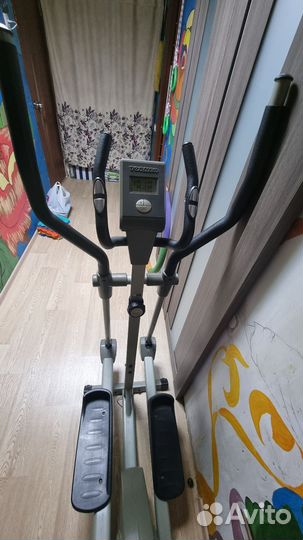 Эллиптический тренажер torneo