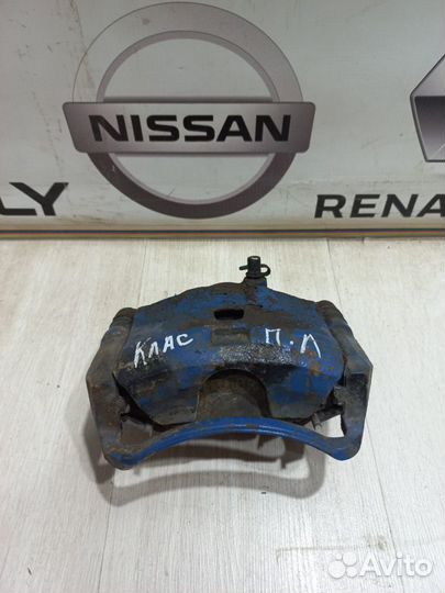 Суппорт тормозной перед Nissan almera classic B10