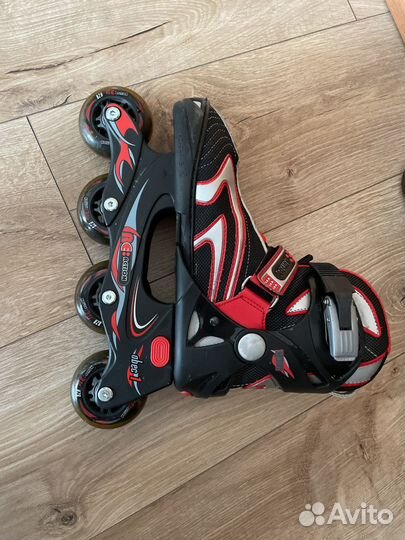 Роликовые коньки