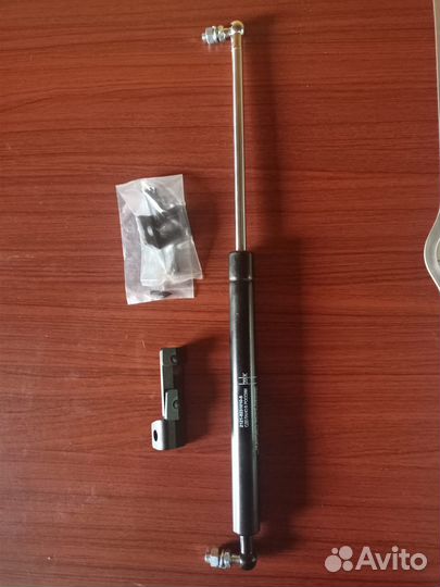 Пневмоупор капота Нива Шевроле