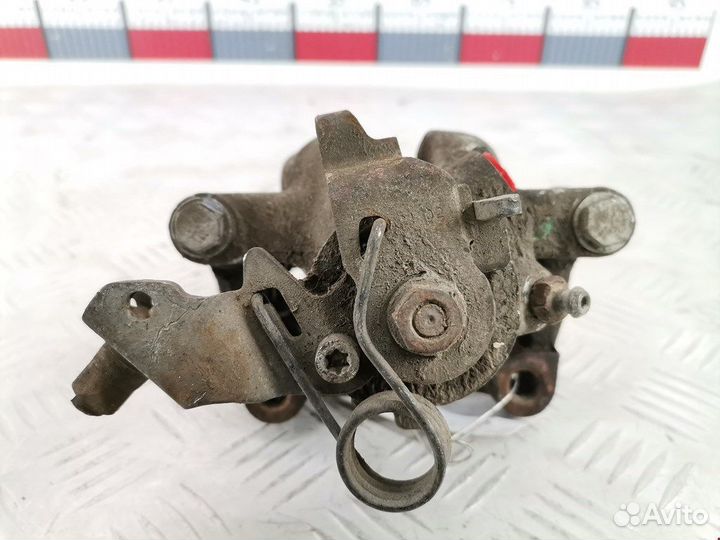 Суппорт задний левый для Opel Zafira A