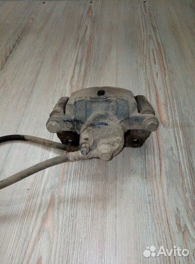 Суппорт тормозной перед Geely MK Лев