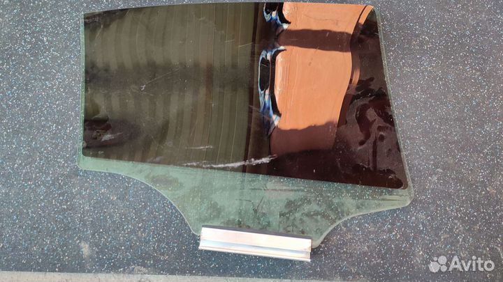 Стекло двери заднее левое Opel Astra H седан