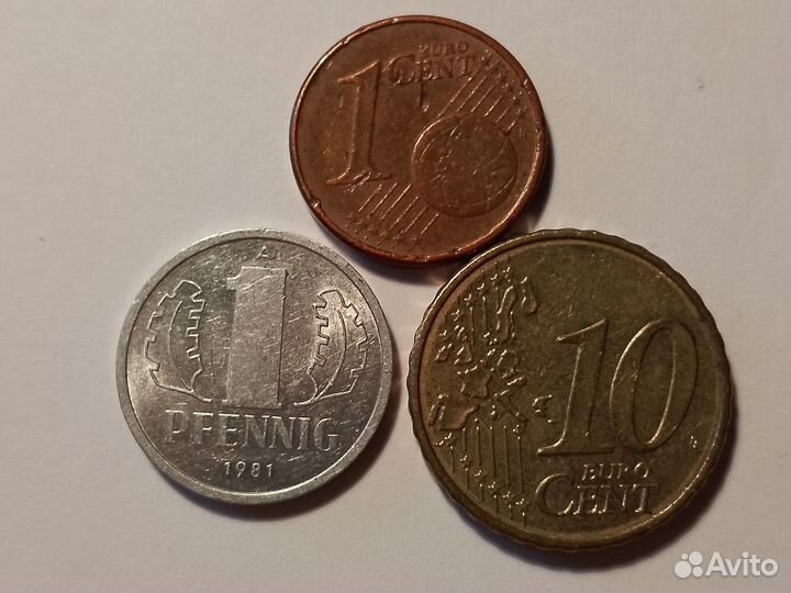 Монеты 1 phenning и Центы США