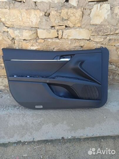 Обшивка двери camry 75