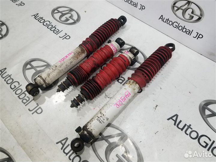 Амортизатор/стойка задняя левая Mazda Proceed Marvie