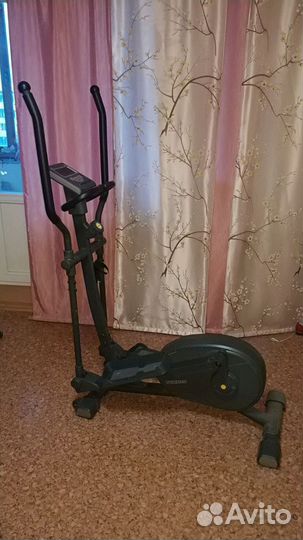 Эллиптический тренажер torneo
