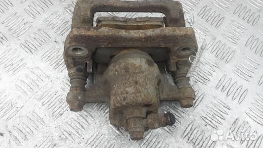 Суппорт тормозной задний правый mazda CX-7 1 (KUK0