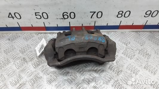 Суппорт тормозной передний левый KIA sorento 2 (SK