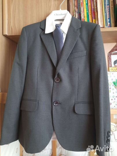 Новый школьный костюм для мальчика 134