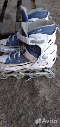 Роликовые коньки