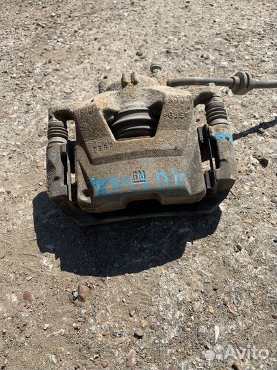 Суппорт передний левый Chevrolet Cruze