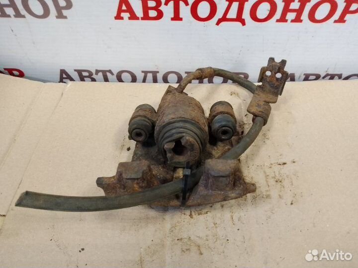 Суппорт тормозной задний левый Dodge Stratus 2.4