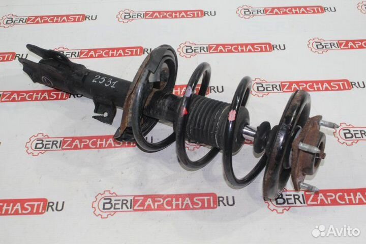 Амортизатор передний левый Mitsubishi Lancer 10