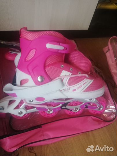 Роликовые коньки