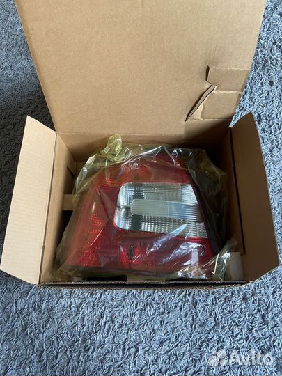 Фонарь габаритный левый skoda octavia