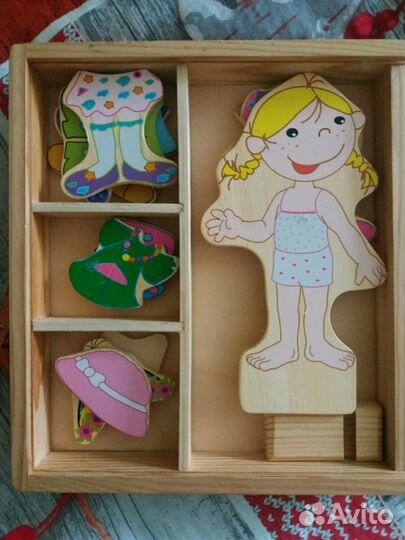 Деревянная игра одень куклу